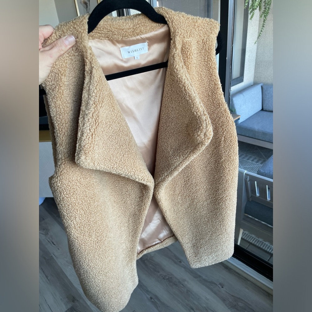 Chic camel vest.  Size small.  100% polyester.